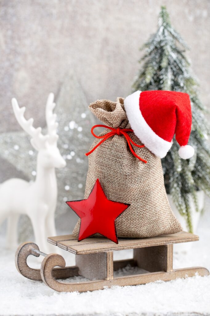 Christmas gard. Gift bag with burlap. Christmas decoration.